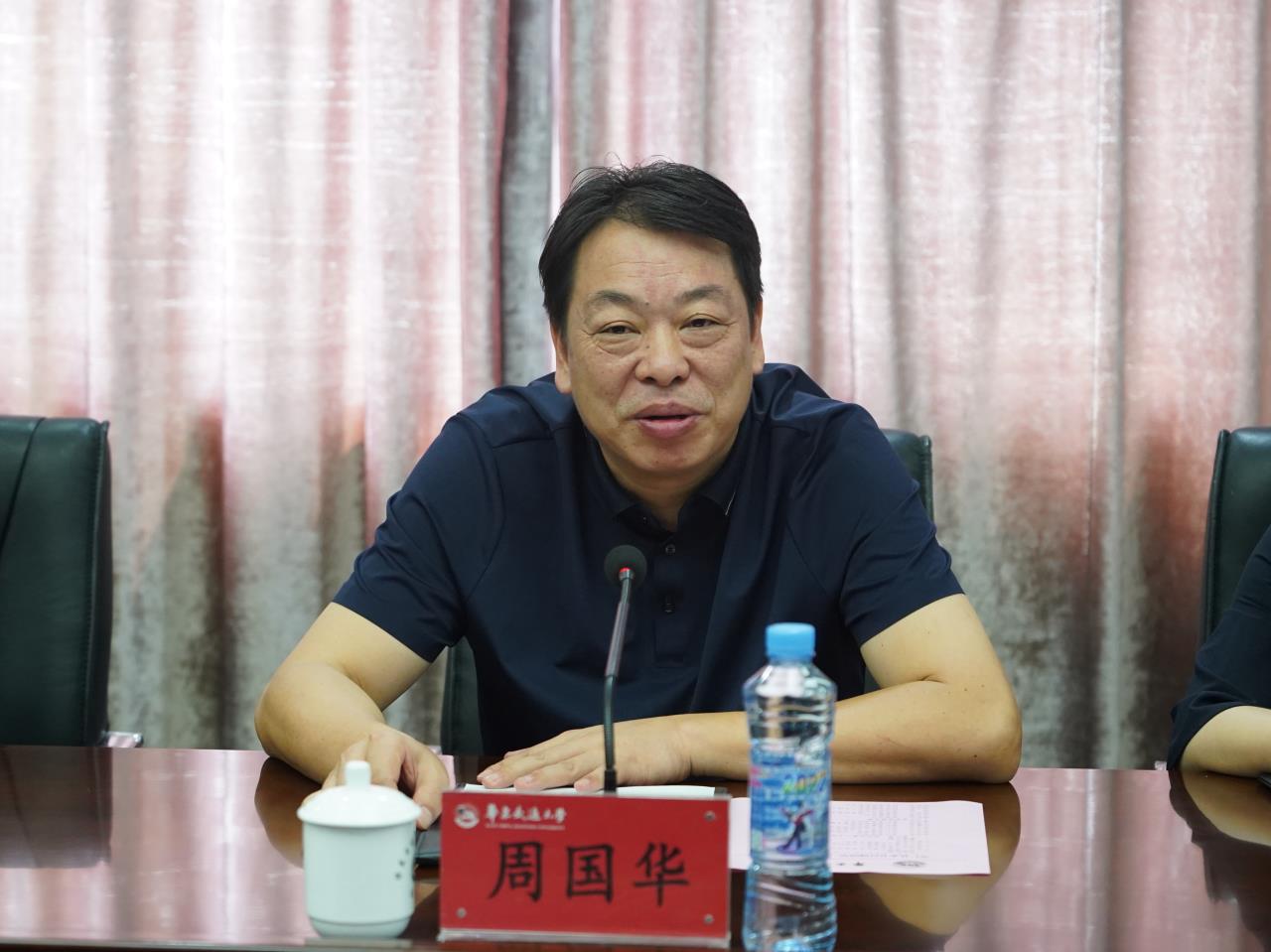 崇仁县委书记周国华一行来校走访交流